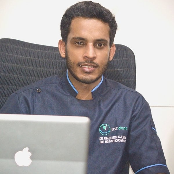 Portrait of Dr. Prashanth C John, Orthodontist & Dentofacial Orthopedist, Co-Founder at Just Dent