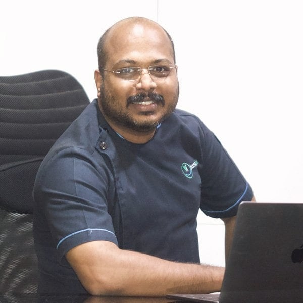 Portrait of Dr. Rathan Das, Oral & Maxillofacial Surgeon at Just Dent